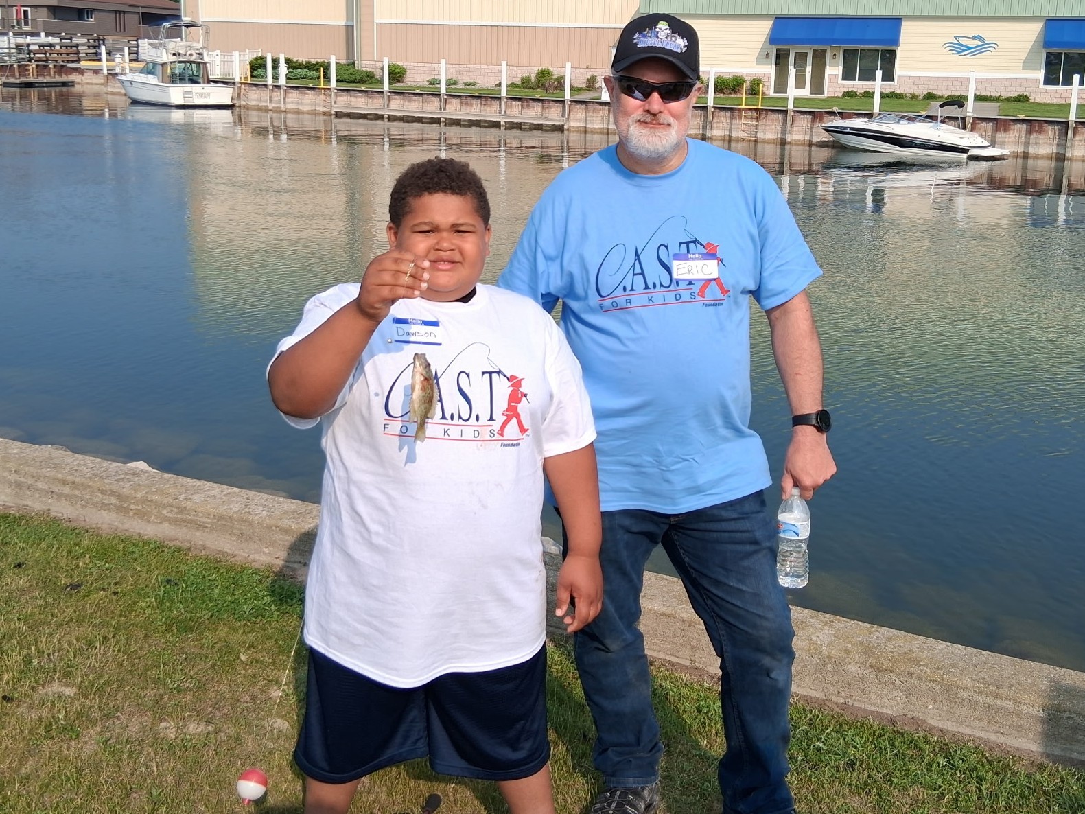 25Cheboygan1 young boy showing off fish at Cheboygan