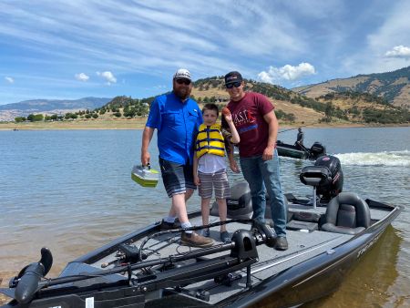 Emigrant Lake 1 participants with fish on the boat