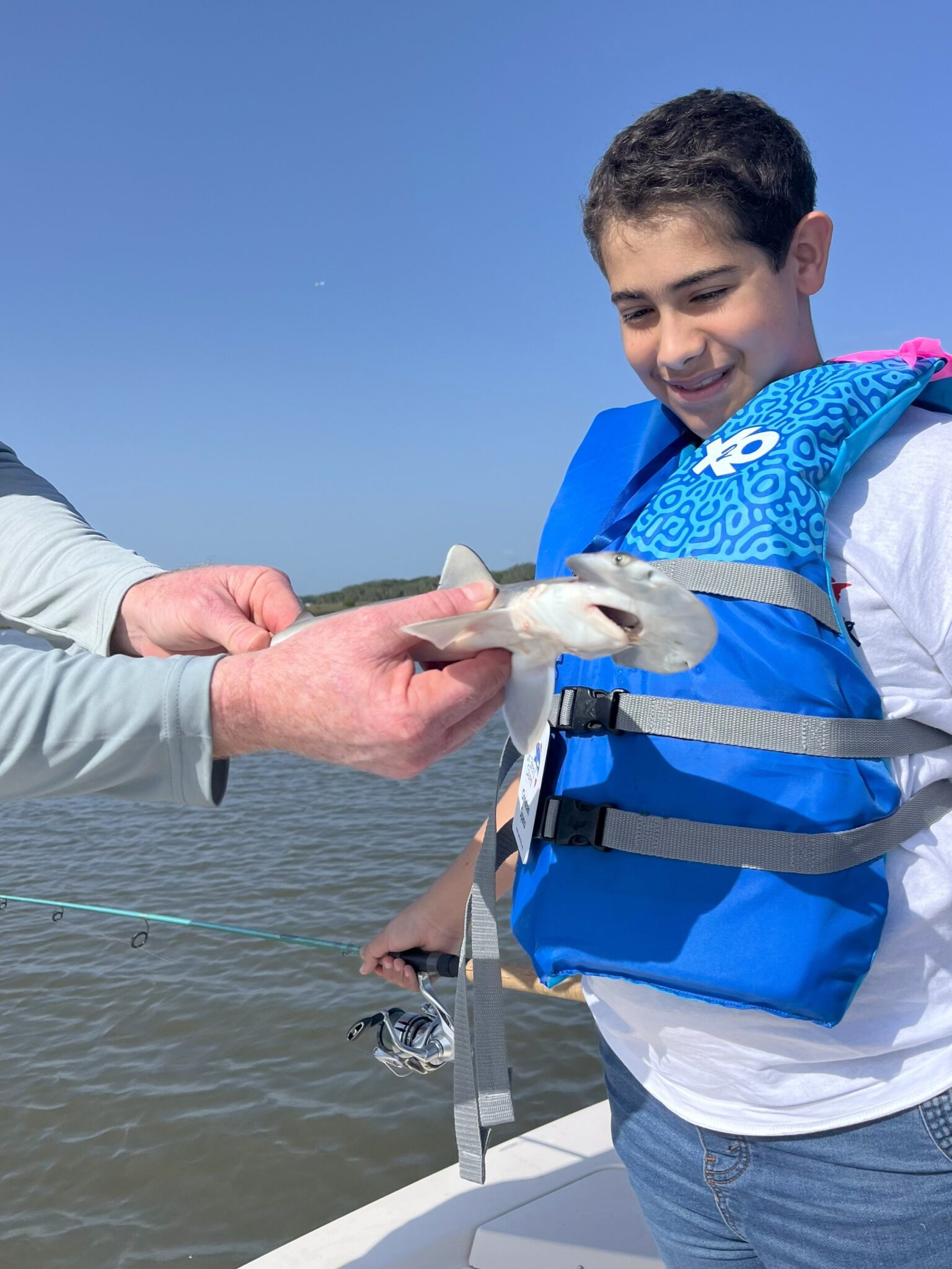 25StJohnsCounty4 person holding fish at st johns county