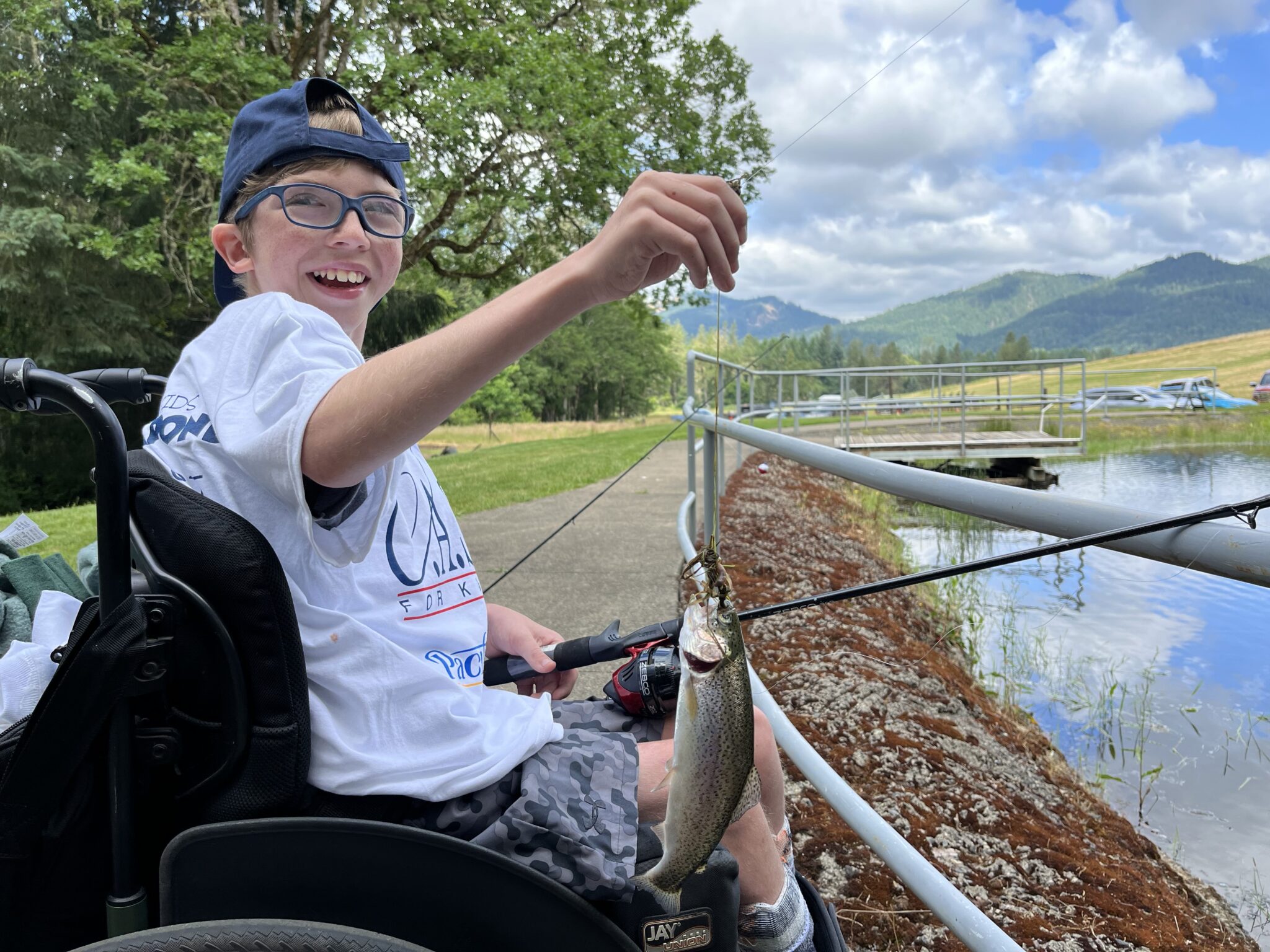 Bowman Pond4 boy fishing at bowman pond