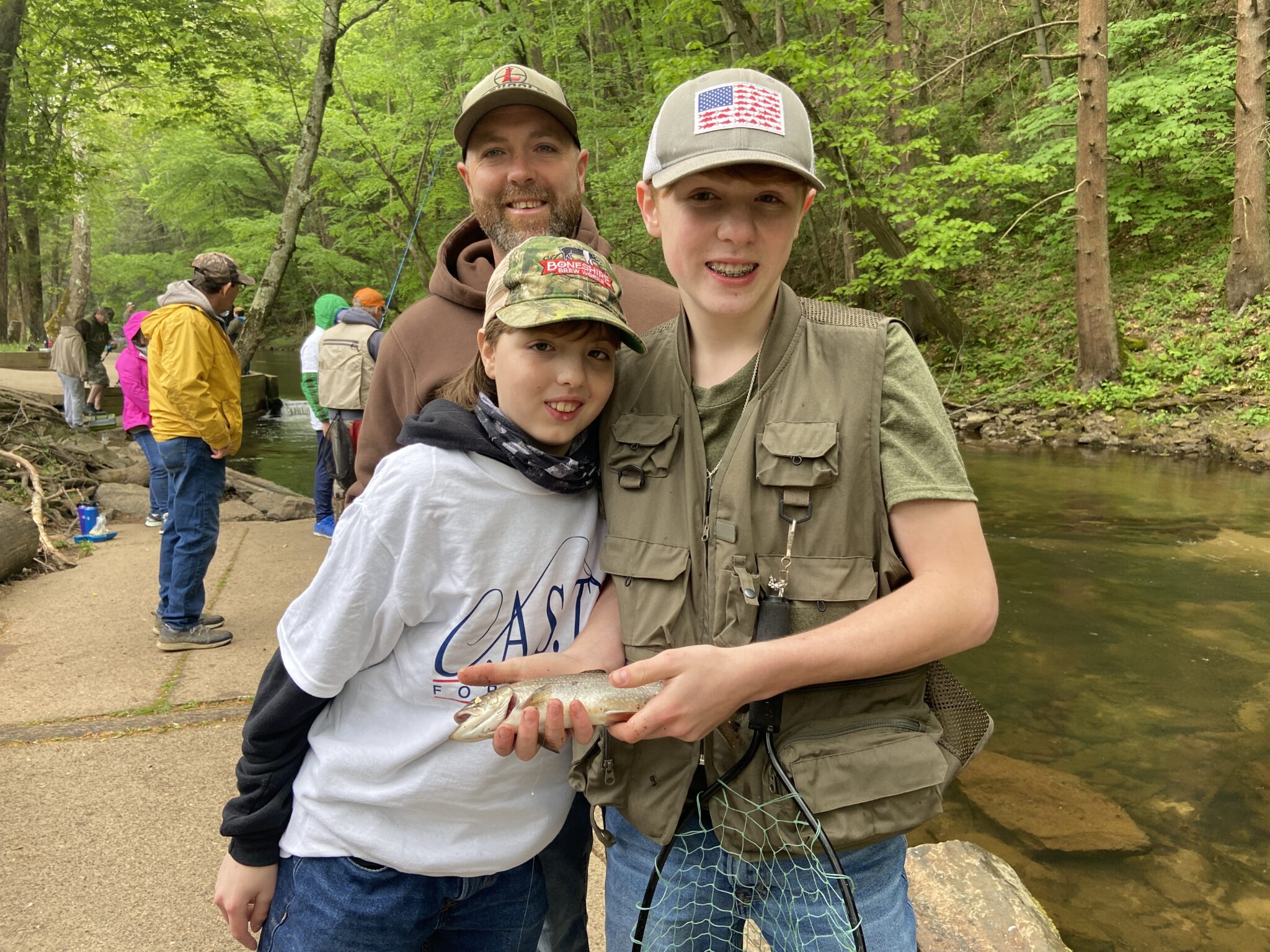 Clarks Valley4 two participants showing a fish at Clarks Valley
