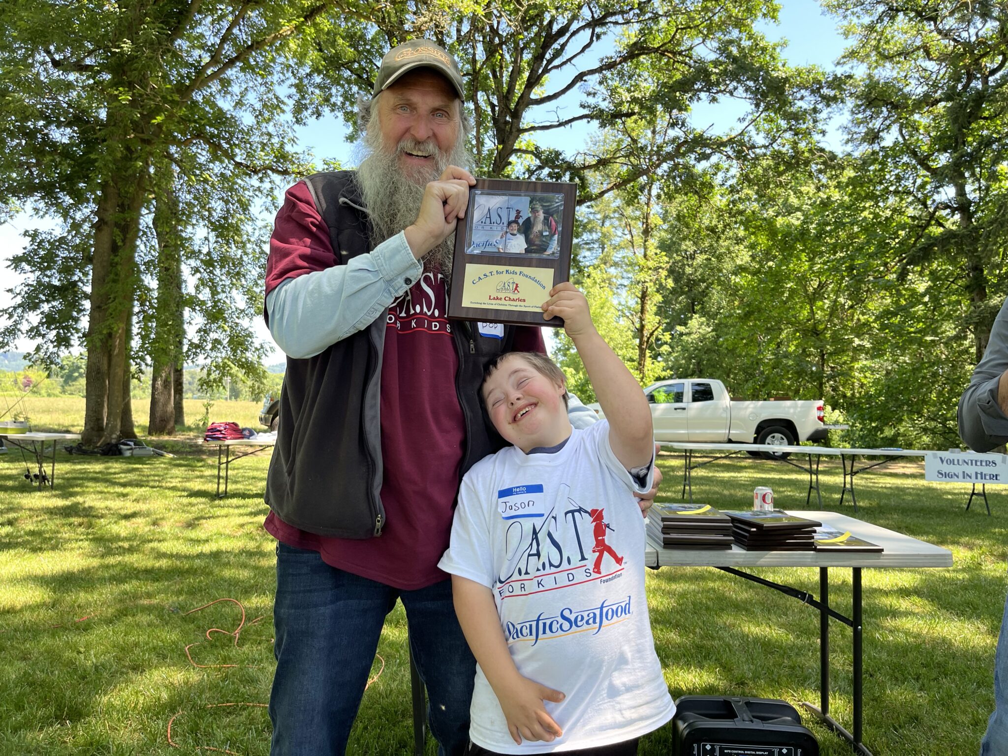 Lake Charles4 participant holding plaque at lake charles