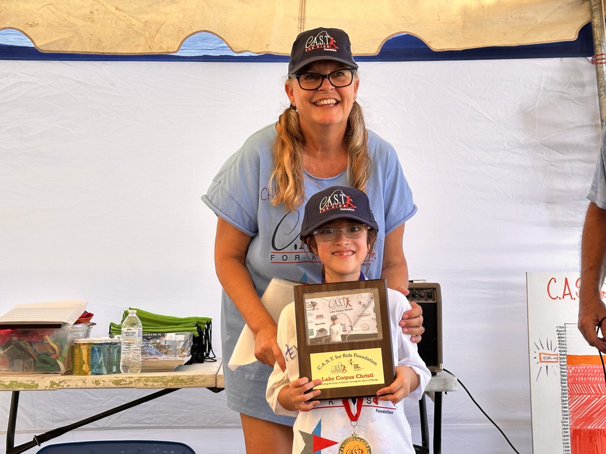 Lake Corpus Christi SP4 child holding plaque at The Wright Place Ranch