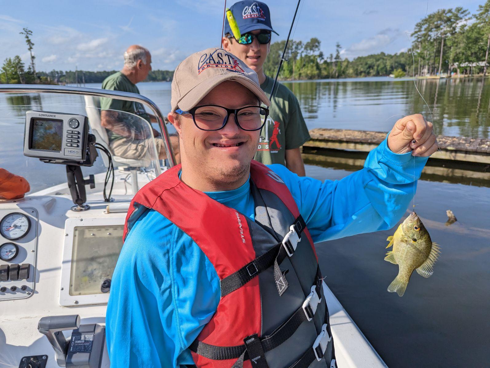 LakeMurray1 participant showing off fish at lake murray