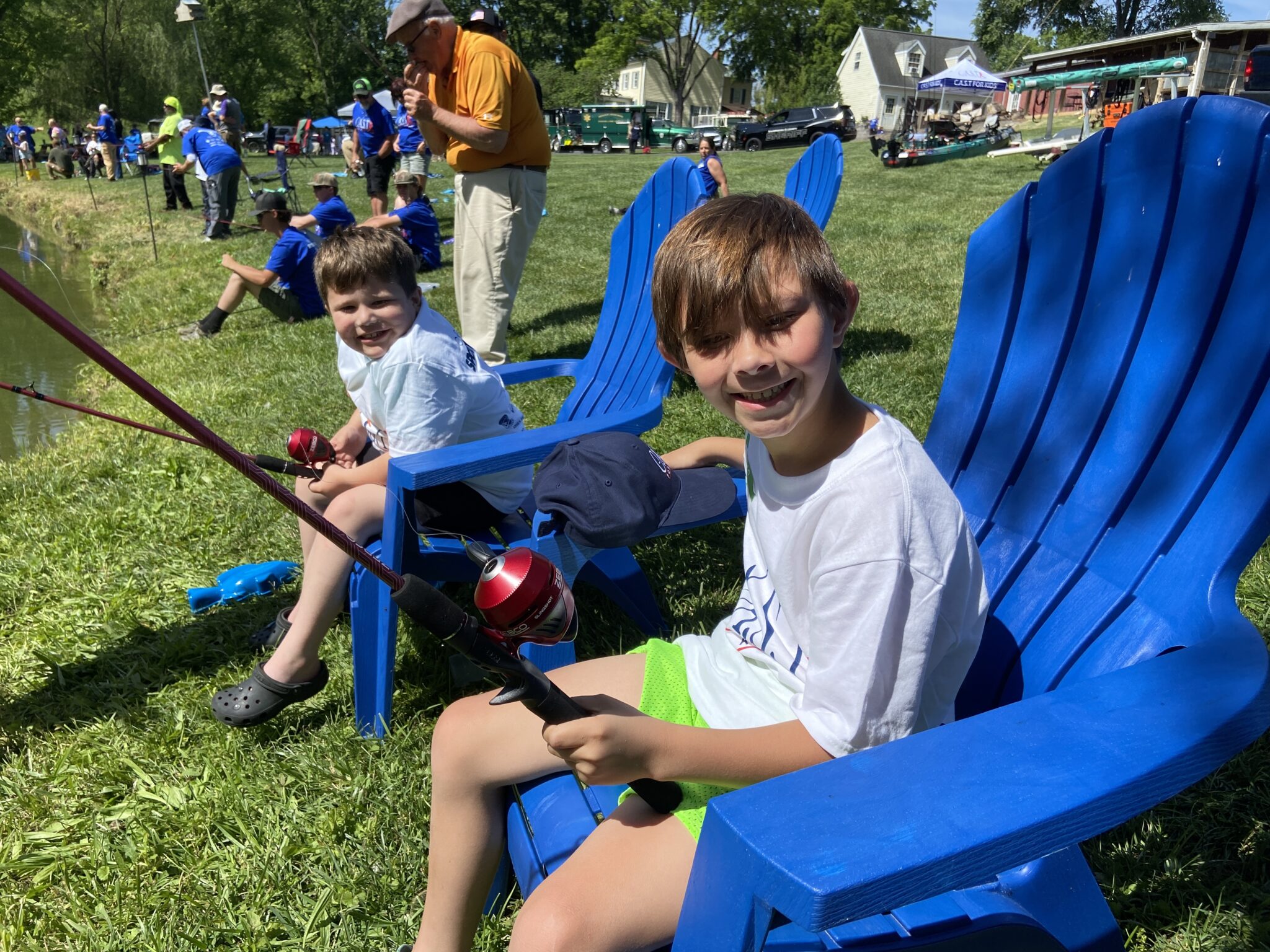 boy in chair fishing at Spotted Dog Inn