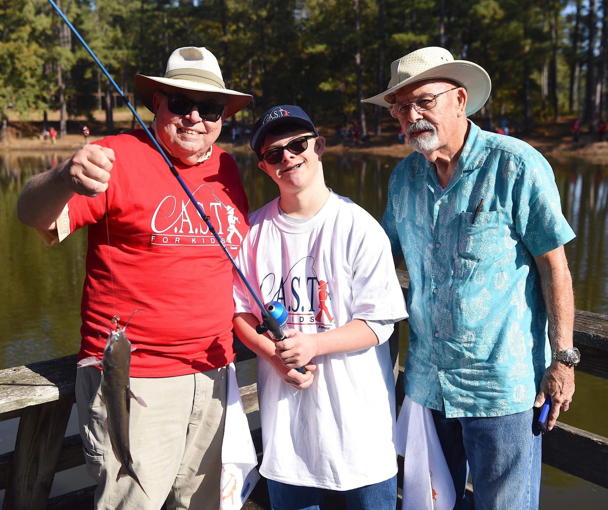 WalkerCountyLake1 three participants showing off fish at Walker County Lake