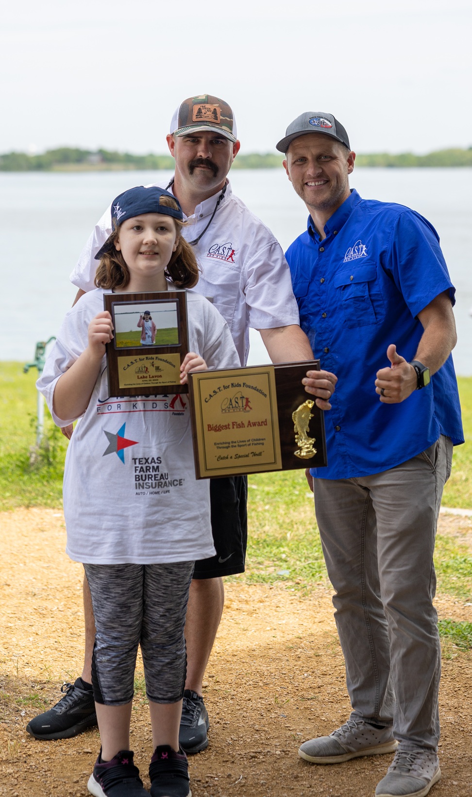 lakelavon4 volunteers and participant holding plaques