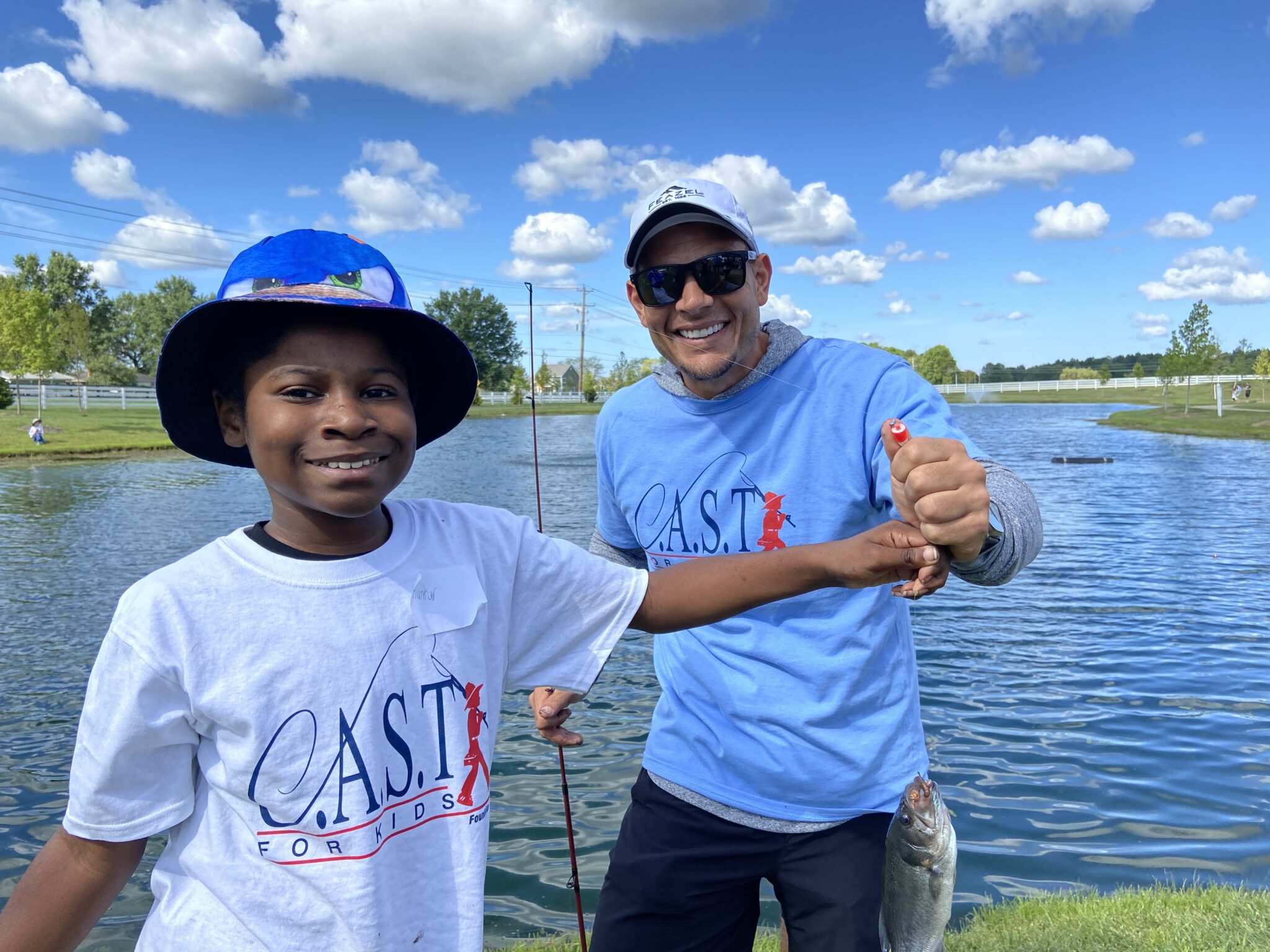 middle photo top row of vol page young man participant fishing