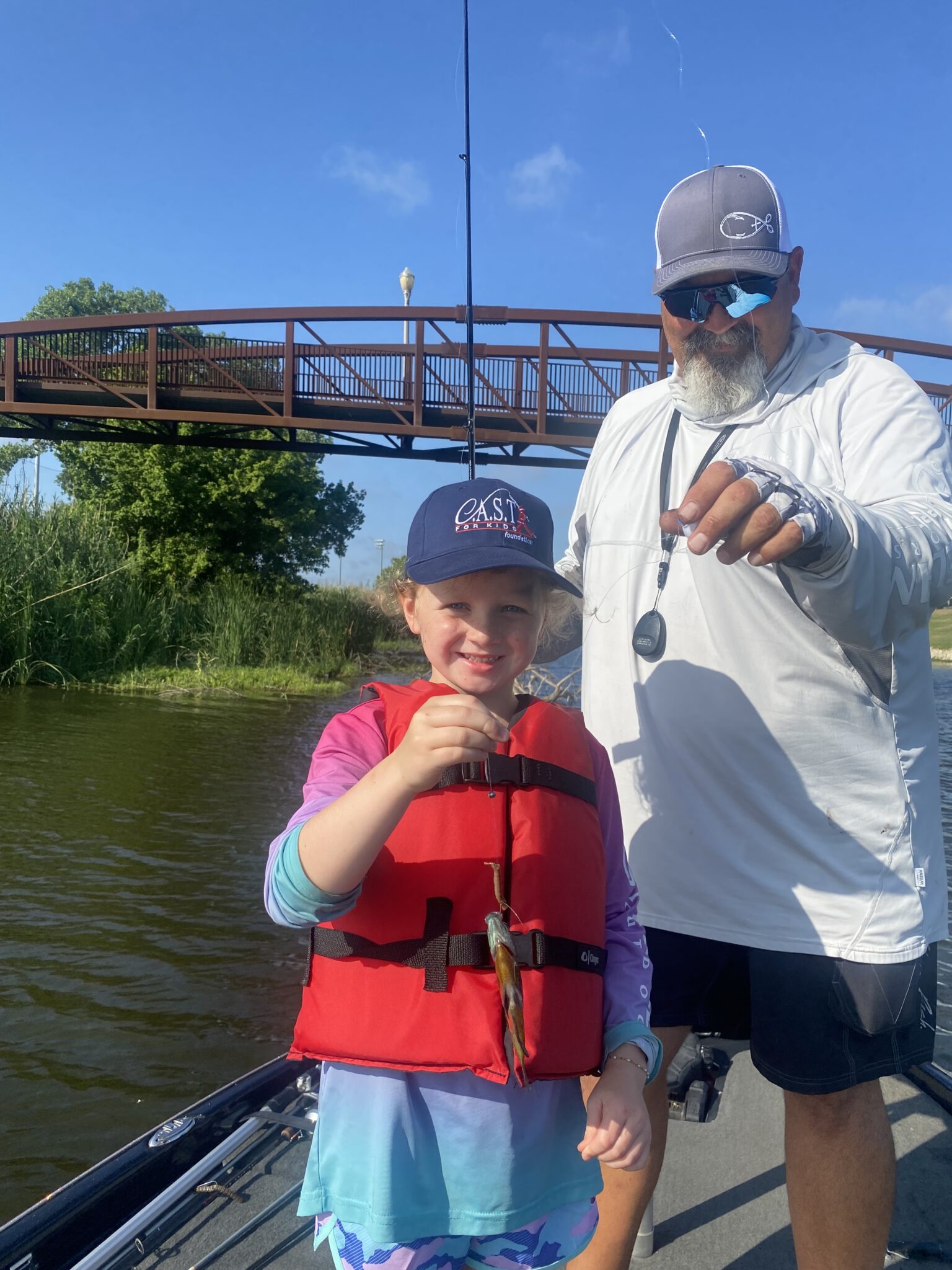 waco1 young boy showing off fish at McLane Stadium