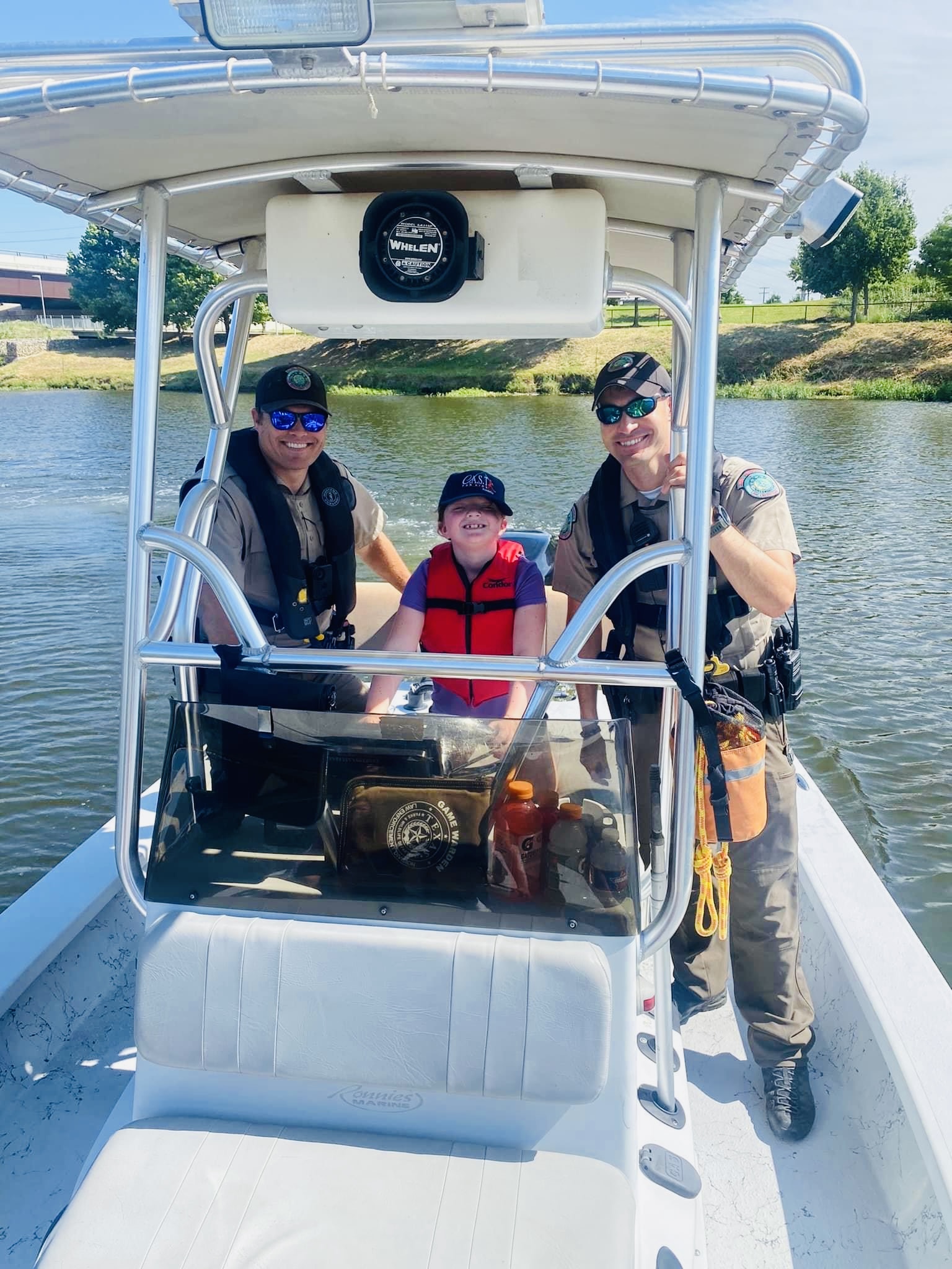 waco4 participants on boat at McLane Stadium