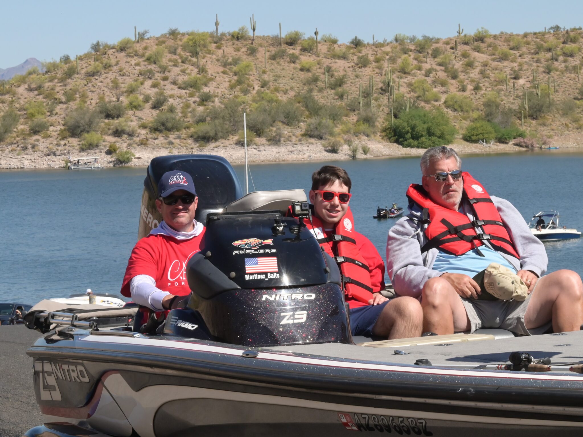 25LakePleasant3 three people on boat at lake pleasant