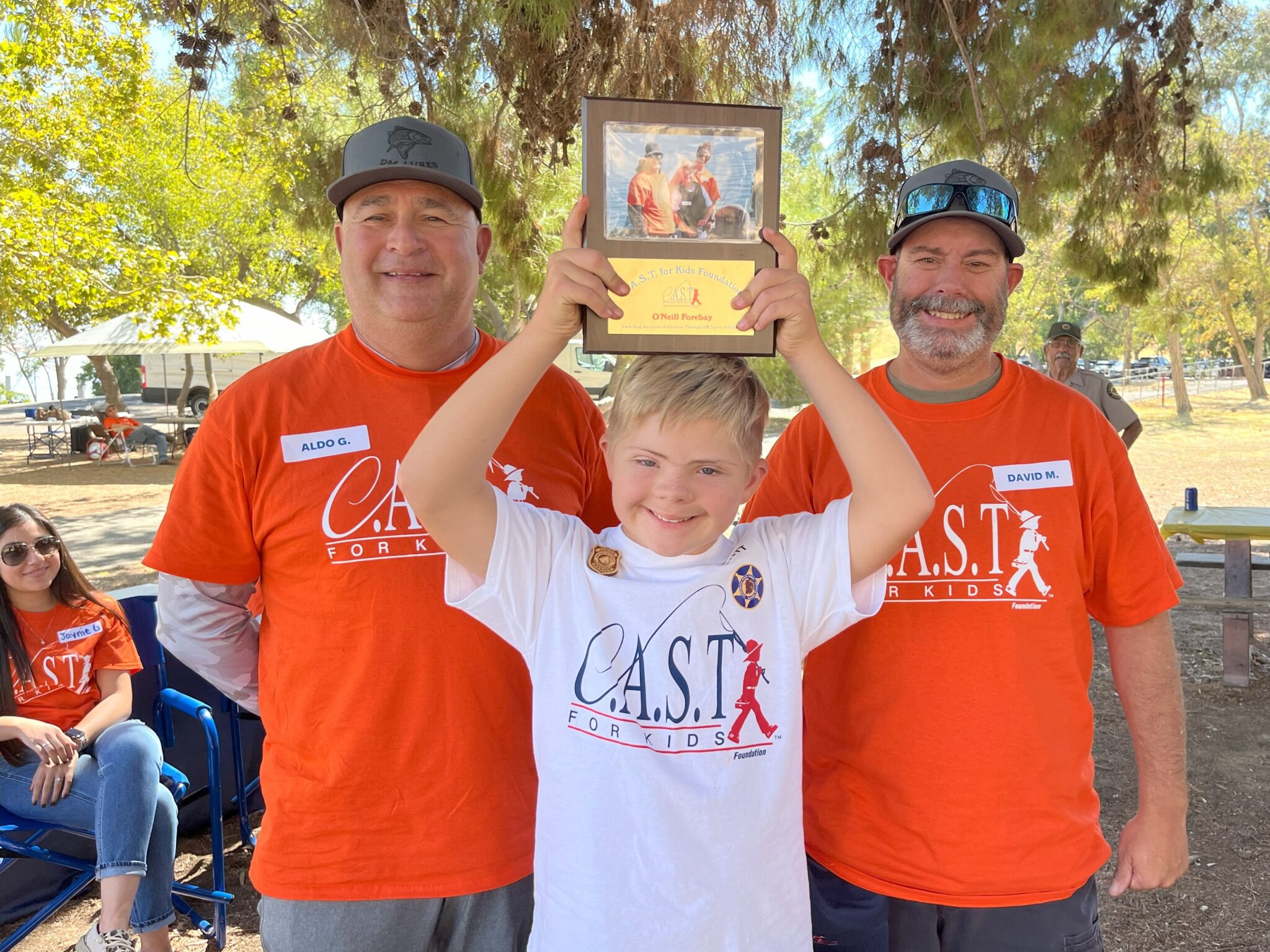 three participants at Saugatuck River