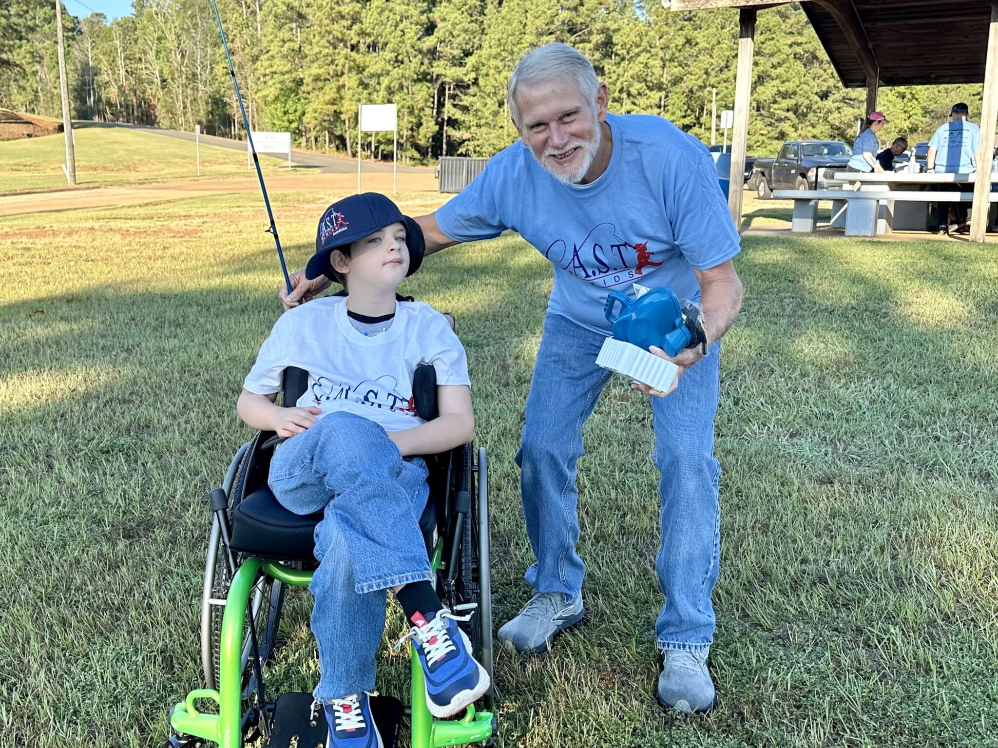 participant showing off fish at The Boulders at Lake Tyler